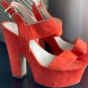 Orange suede heeled Sandals.